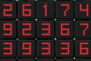 Shifra LED të kuqe në një ekran, të vendosura në një rrjet katror