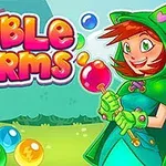 Personazh me flokë të kuqe dhe kapuç jeshil në krah të majtë, duke mbajtur një top me ngjyra, me pone me ngjyra të ndryshme dhe titullin Bubble Charms në krye