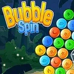 Flluska shumëngjyrëshe të mbledhura në formë rrethore me një yll të verdhë në qendër mbi një sfond me natyrë të errët dhe teksti Bubble Spin