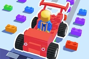 Një figurë me gjymtyrë katrore që ngas një makinë të kuqe ndërtuar nga blloqet plastike me ngjyra në një rrugë të mbushur me blloqe në sfond