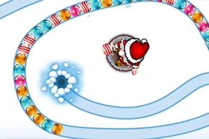 Një figurë e një personazhi të veshur si Santa që qëllon topa ngjyrash përgjatë një spiraleje bore