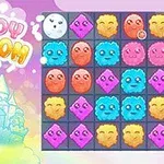 Logo me emrin Cloudy Kingdom dhe tabela me ikona shumëngjyrëshe të krijesave të ndryshme në sfond ngjyrash pastel