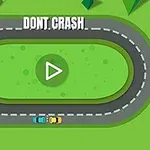 Dy makina me ngjyra të ndezura në një pistë ovale në një sfond të gjelbër, me butonin e luajtjes në qendër dhe tekstin “DONT CRASH” sipër