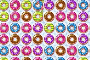 Një model i organizuar me rreshta të shumëfishtë me donuts shumëngjyrëshe, përfshirë ngjyra rozë, jeshile dhe kafe