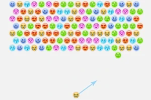 Rreshta ikonash shumëngjyrëshe me fytyra emoji të ndryshme janë në pjesën e sipërme të ekranit, ndërsa një emoji i vetëm me një shigjetë drejtuese ndodhet poshtë