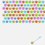 Rreshta ikonash shumëngjyrëshe me fytyra emoji të ndryshme janë në pjesën e sipërme të ekranit, ndërsa një emoji i vetëm me një shigjetë drejtuese ndodhet poshtë