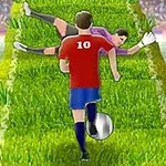 Një lojtar futbolli me fanellë të kuqe dhe numrin 10 është duke dribluar topin drejt portierit që shtrihet në tokë, në një fushë barishtore, me stadiumin mbushur me tifozë në sfond