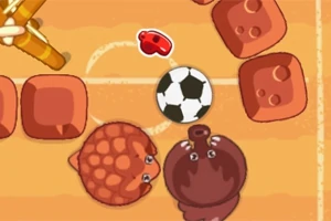 Dy kafshë të vogla, një top futbolli dhe disa blloqe të kuqe mbi një sfond portokalli