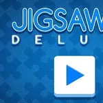 Teksti Jigsaw Deluxe me sfond blu dhe ikonë luajtjeje