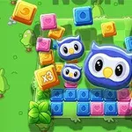 Një ilustrim me tre bufë blu në një sfond të gjelbër rrethuar nga kube shumëngjyrëshe