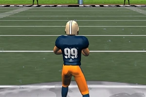 Lojëtar me fanellë blu dhe numrin 99 në shpinë qëndron në një fushë futbolli amerikan, i veshur me pantallona të verdha dhe helmetë