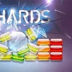 Fjala Shards e shkruar mbi copa qelqi dhe blloqe të ngjyrosura në sfond të errët