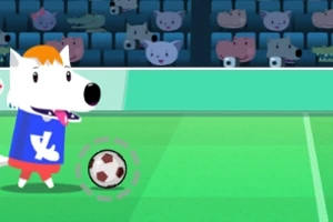 Një personazh i animuar si qeni me një bluzë blu në një fushë futbolli, ndërsa topi qëndron pranë tij dhe sfondi përmban spektatorë të kafshëve