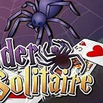 Merimangë mbi sfond me tulla dhe letra me fjalët Spider Solitaire