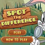 Një lepur i bardhë dhe gri me lupë në dorë qëndron pranë një tabele me mbishkrimin Spot the Difference, në sfond natyror