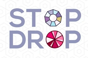 Teksti STOP DROP me letra të mëdha, me fjalën O të zëvendësuar nga figura gjeometrike shumëngjyrëshe