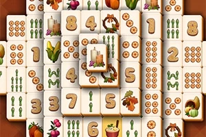 Dërrasa të bardha me simbole të ndryshme si numra, fruta, perime dhe dekorime festive janë vendosur në një formacion grumbulluar