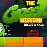 Një personazh jeshil me sy të mëdhenj dhe këpucë blu qëndron mbi blloqe me ngjyra dhe tekstin The Green Mission Inside a Cave në sfond