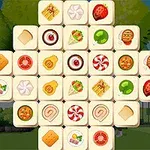 Pamje e një puzzle me pllaka që përmbajnë imazhe ushqimesh të ndryshme si ëmbëlsira dhe fruta, në sfond një park me pemë