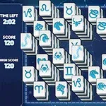 Një grup pllakash me simbole zodiaku të renditura në rreshta të ndryshme mbi sfond blu, me tregues të kohës dhe pikëve në anën e majtë